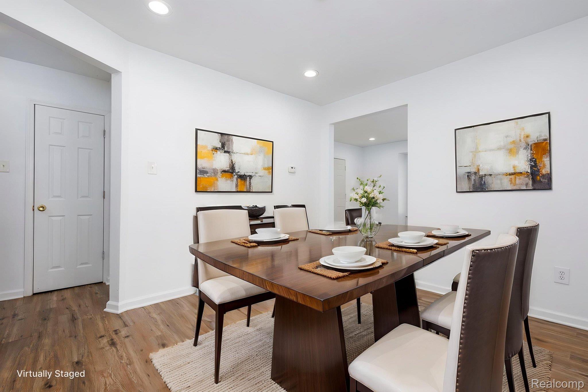 3974 Devonshire Road Detroit, MI 48224 - Photo 6 of 15 Dining area featuring wood-finish flooring, crisp white walls, and recessed lighting