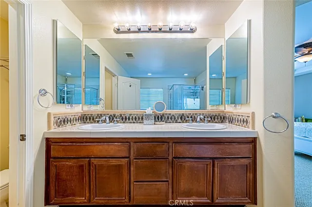 a view of a hallway with washer and dryer