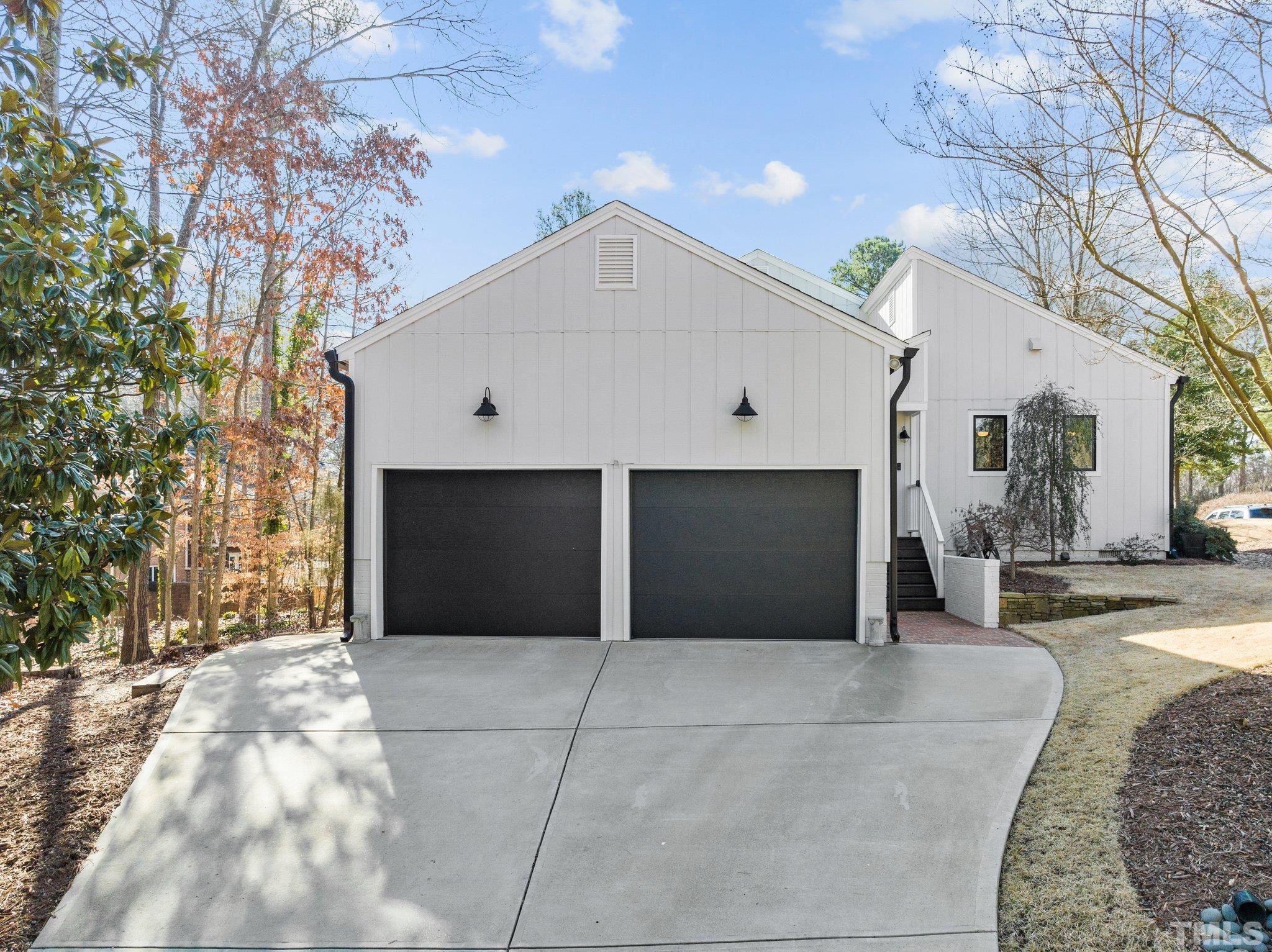 3036 Sylvania Drive Raleigh, NC 27607 - Photo 14 of 59 a front view of a house with yard