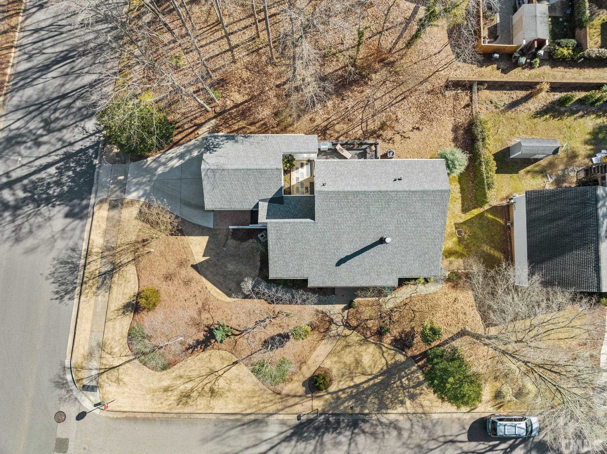 3036 Sylvania Drive Raleigh, NC 27607 - Photo 15 of 59 front view of a house with a yard