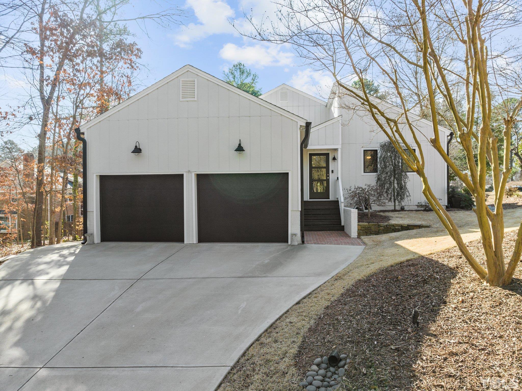 3036 Sylvania Drive Raleigh, NC 27607 - Photo 19 of 59 a front view of house with yard and trees