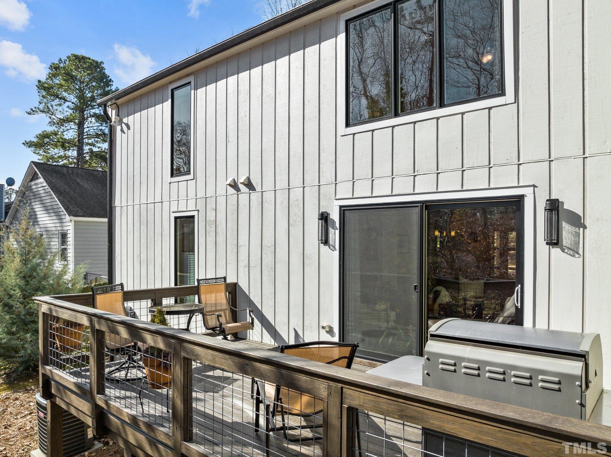 3036 Sylvania Drive Raleigh, NC 27607 - Photo 20 of 59 a couple of table and chair in the balcony