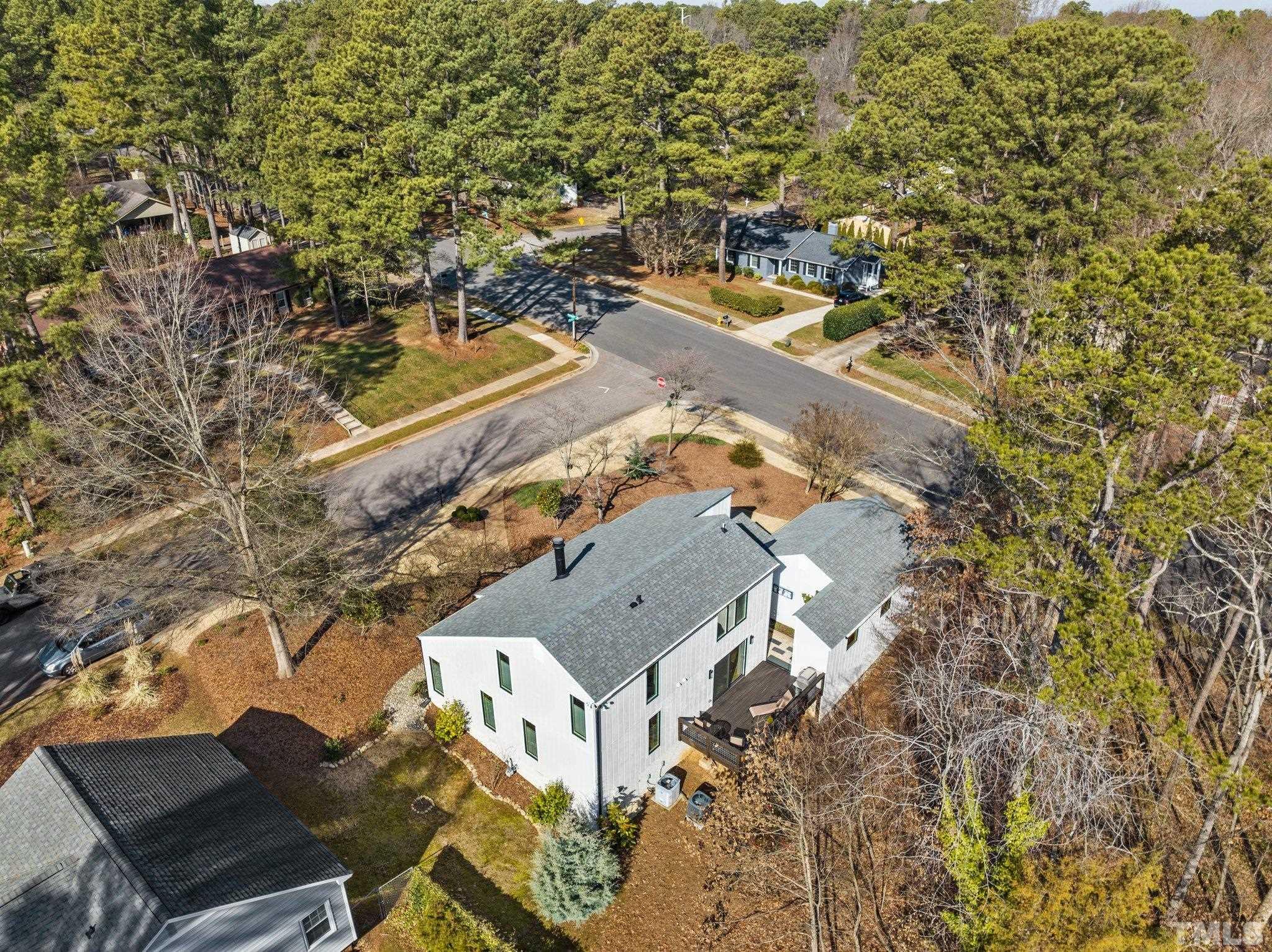 3036 Sylvania Drive Raleigh, NC 27607 - Photo 23 of 59 an aerial view of residential houses with outdoor space
