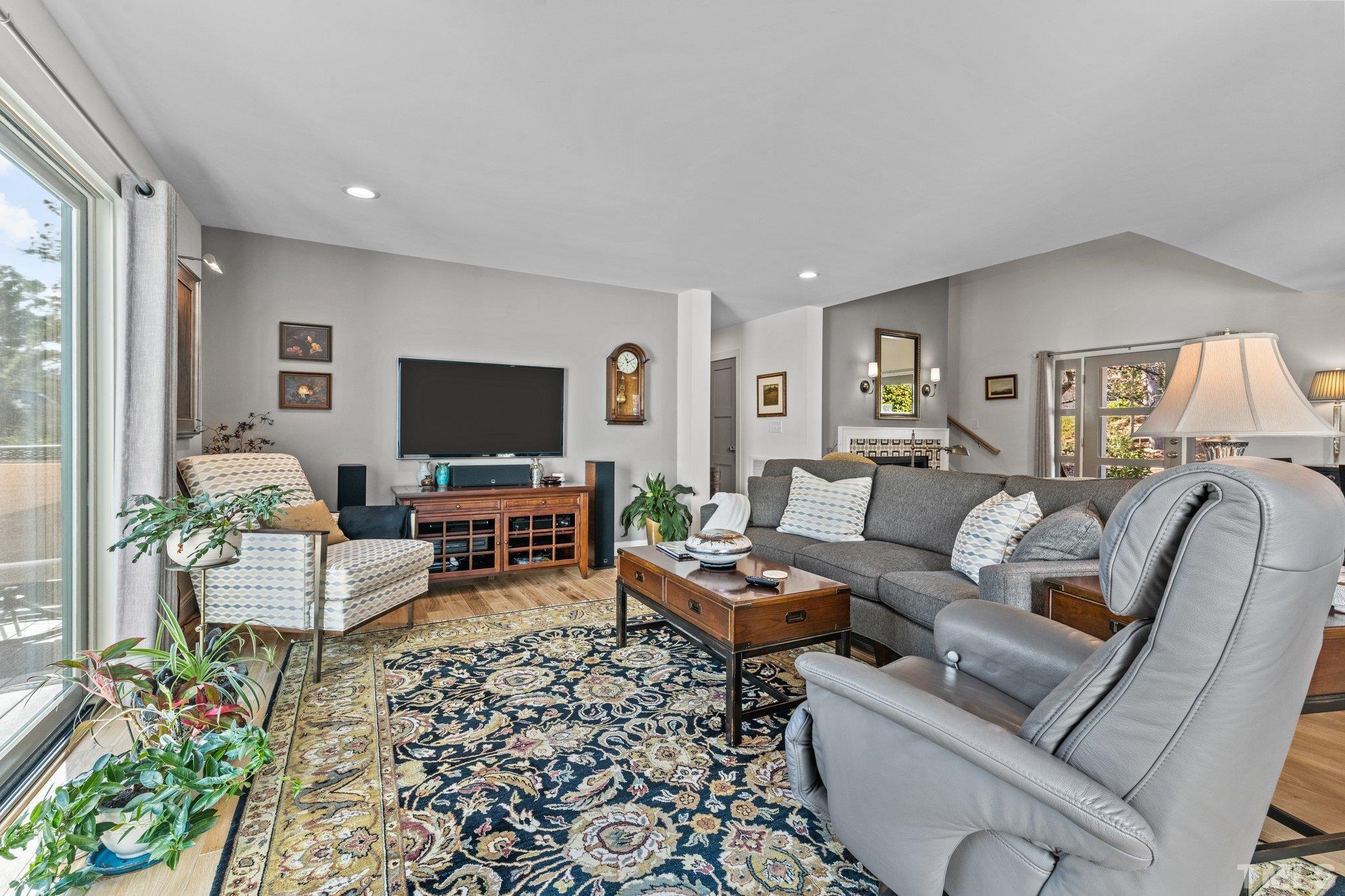 3036 Sylvania Drive Raleigh, NC 27607 - Photo 38 of 59 a living room with furniture and a flat screen tv
