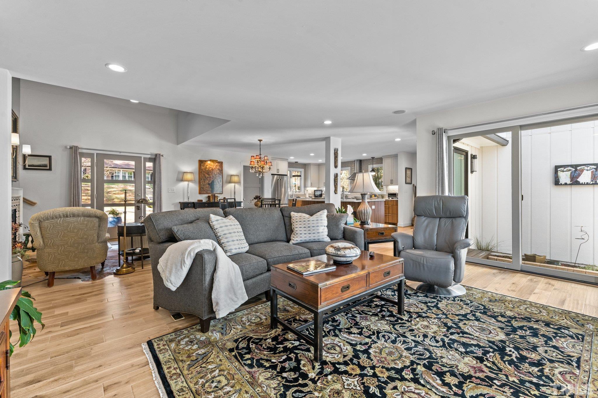 3036 Sylvania Drive Raleigh, NC 27607 - Photo 4 of 59 a living room with furniture or couch and a wooden floor
