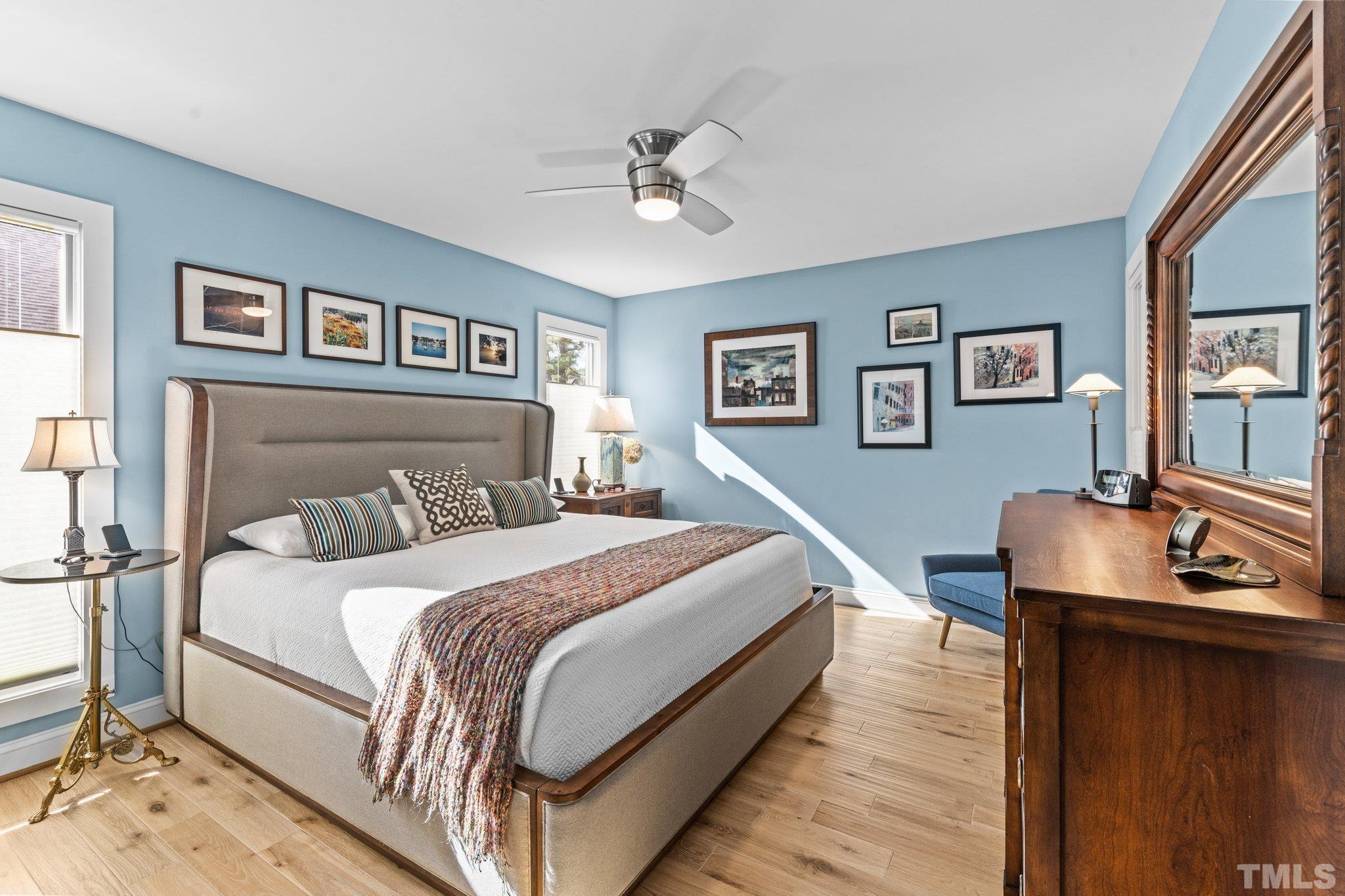 3036 Sylvania Drive Raleigh, NC 27607 - Photo 42 of 59 a bedroom with a bed and a desk