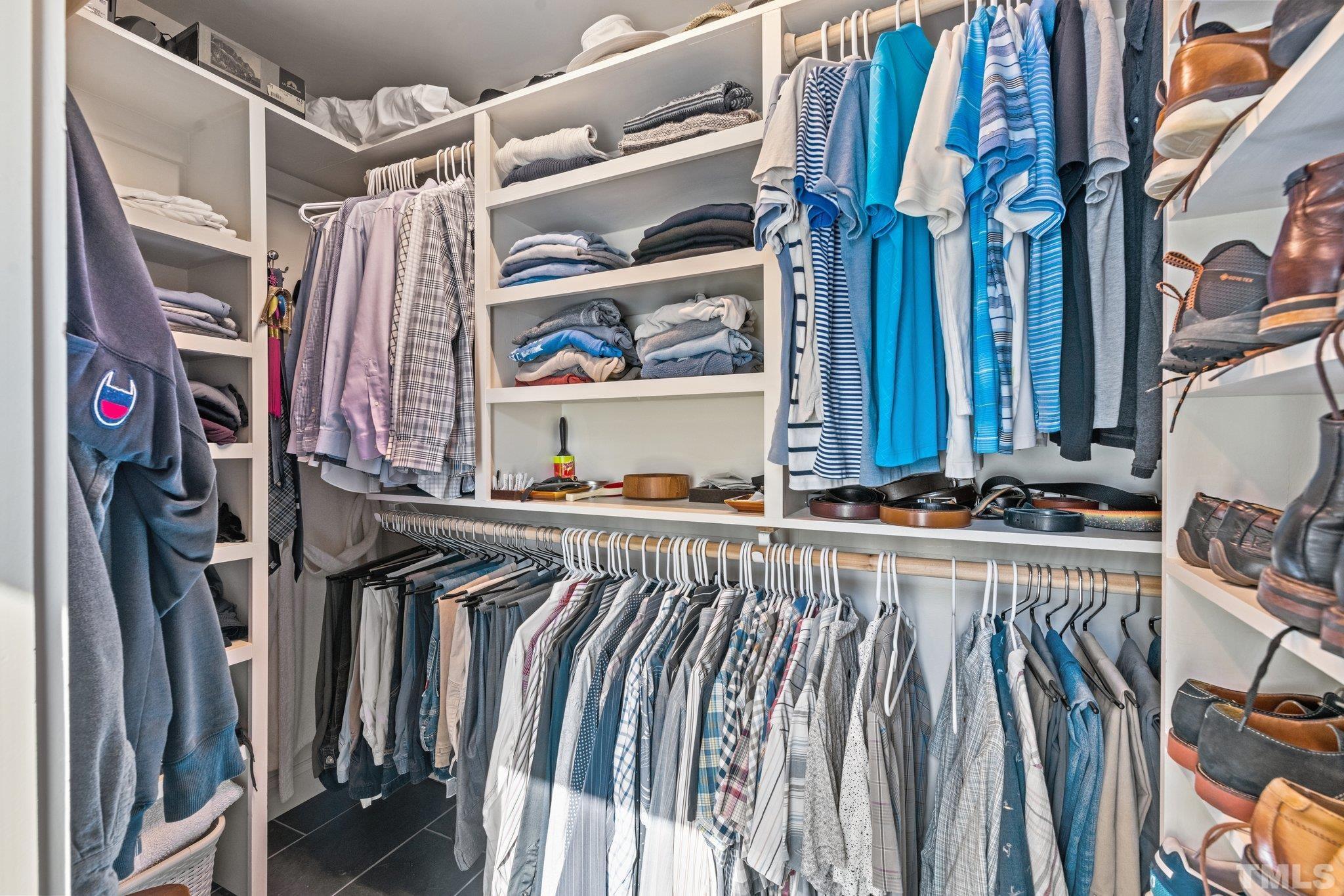 3036 Sylvania Drive Raleigh, NC 27607 - Photo 43 of 59 a view of walk in closet with clothes and shoes