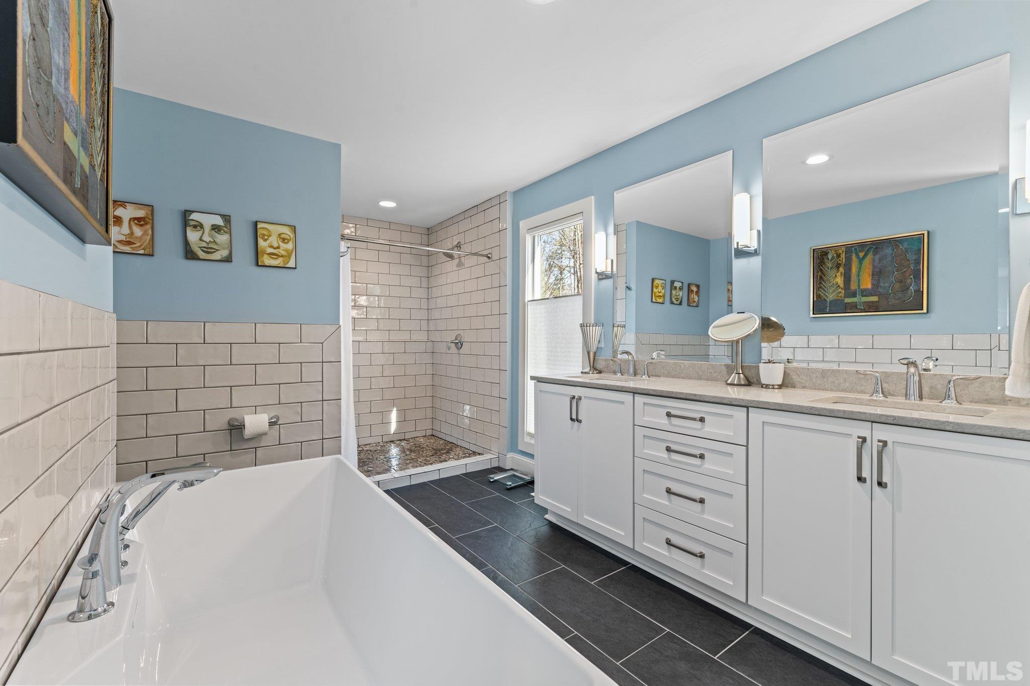3036 Sylvania Drive Raleigh, NC 27607 - Photo 46 of 59 a bathroom with a granite countertop sink mirror and window