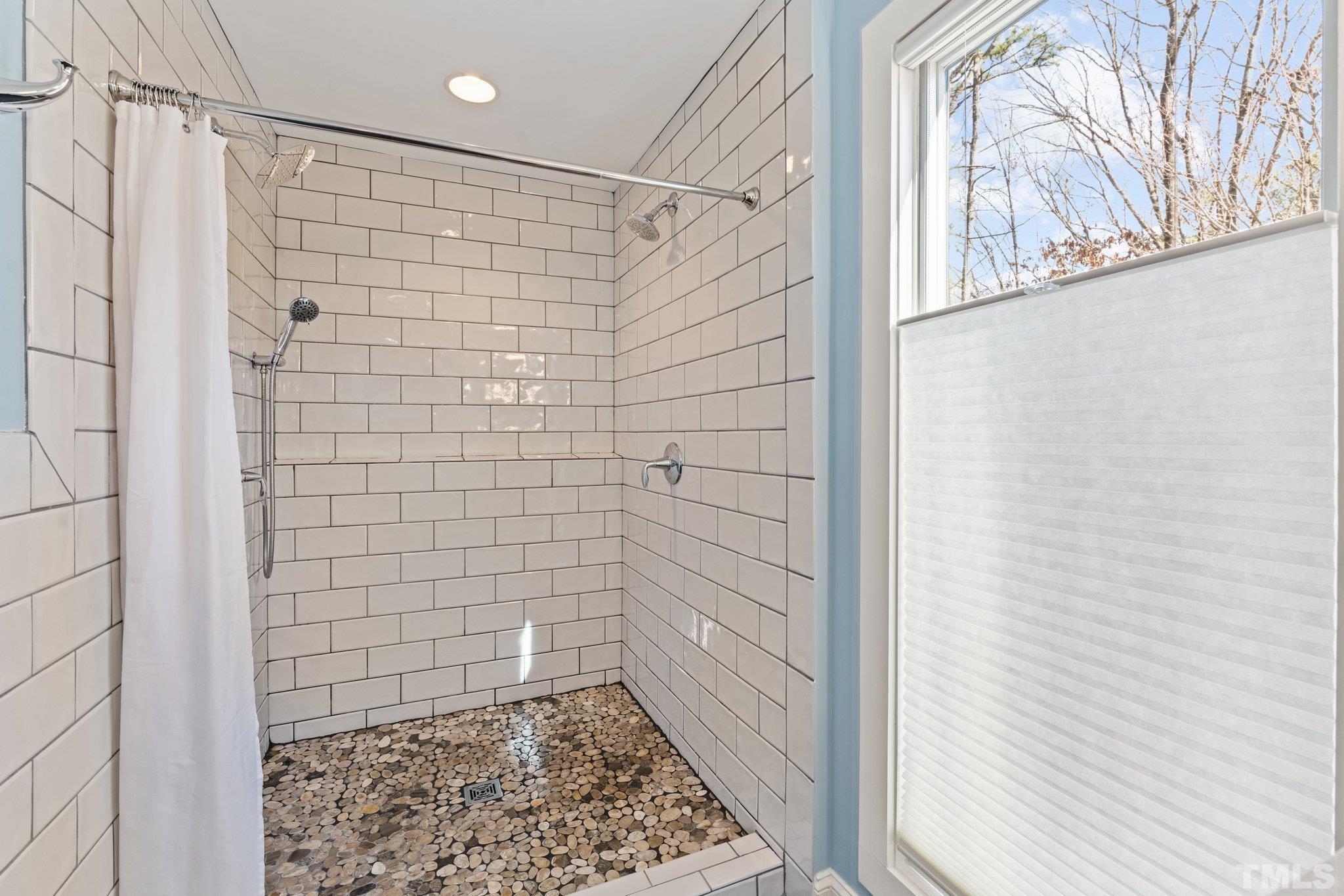 3036 Sylvania Drive Raleigh, NC 27607 - Photo 48 of 59 a bathroom with a shower
