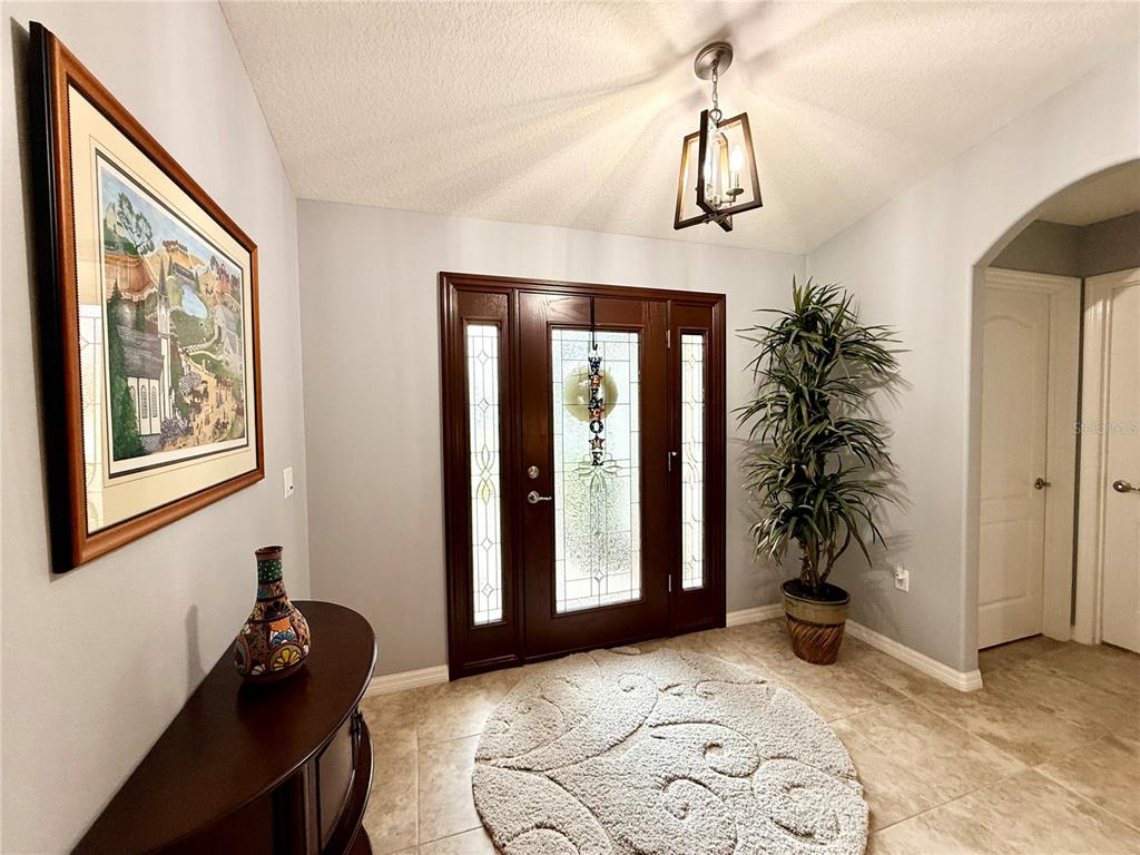 16296 Southwest 15th Court Ocala, FL 34473 - Photo 8 of 70 a living room with furniture and wooden floor