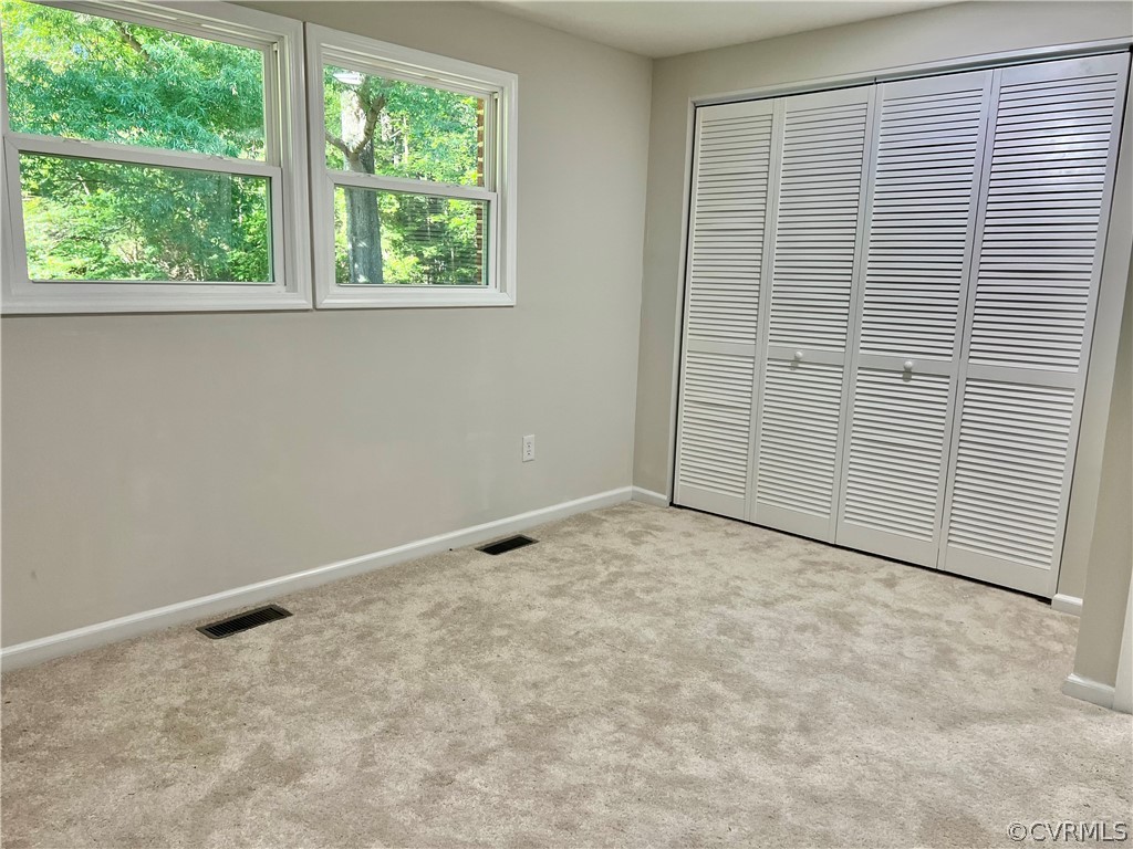 3440 The Loop Road Richmond, VA 23231 - Photo 15 of 22 an empty room with windows