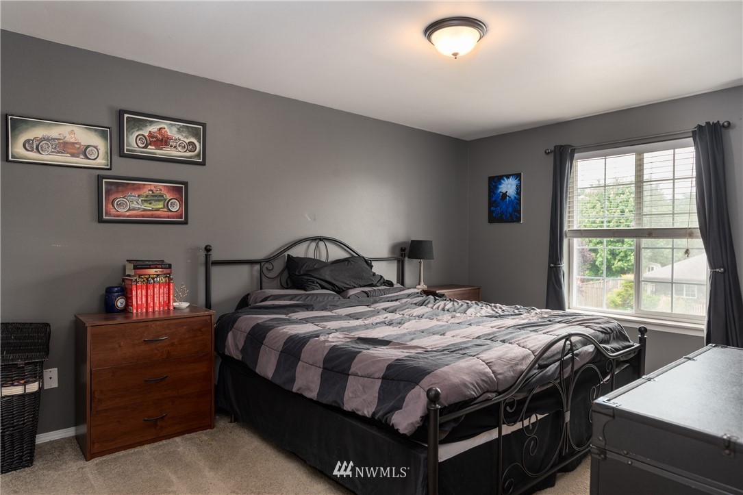 408 Rohrer Loop Sedro-Woolley, WA 98284 - Photo 14 of 20 a bedroom with bed and a window