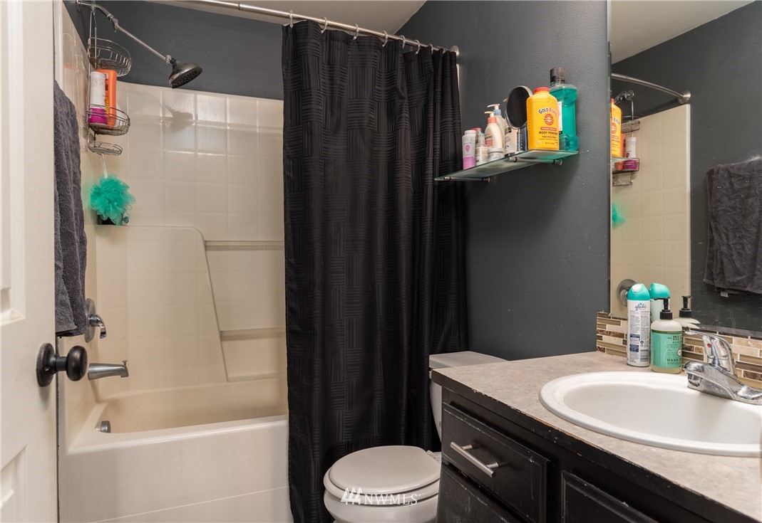 408 Rohrer Loop Sedro-Woolley, WA 98284 - Photo 15 of 20 a bathroom with a sink a toilet and shower