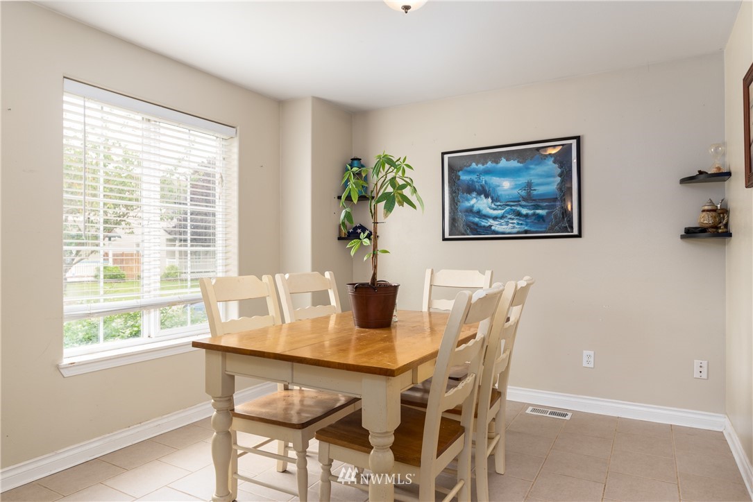 408 Rohrer Loop Sedro-Woolley, WA 98284 - Photo 10 of 20 a view of a dining room with furniture window and outside view