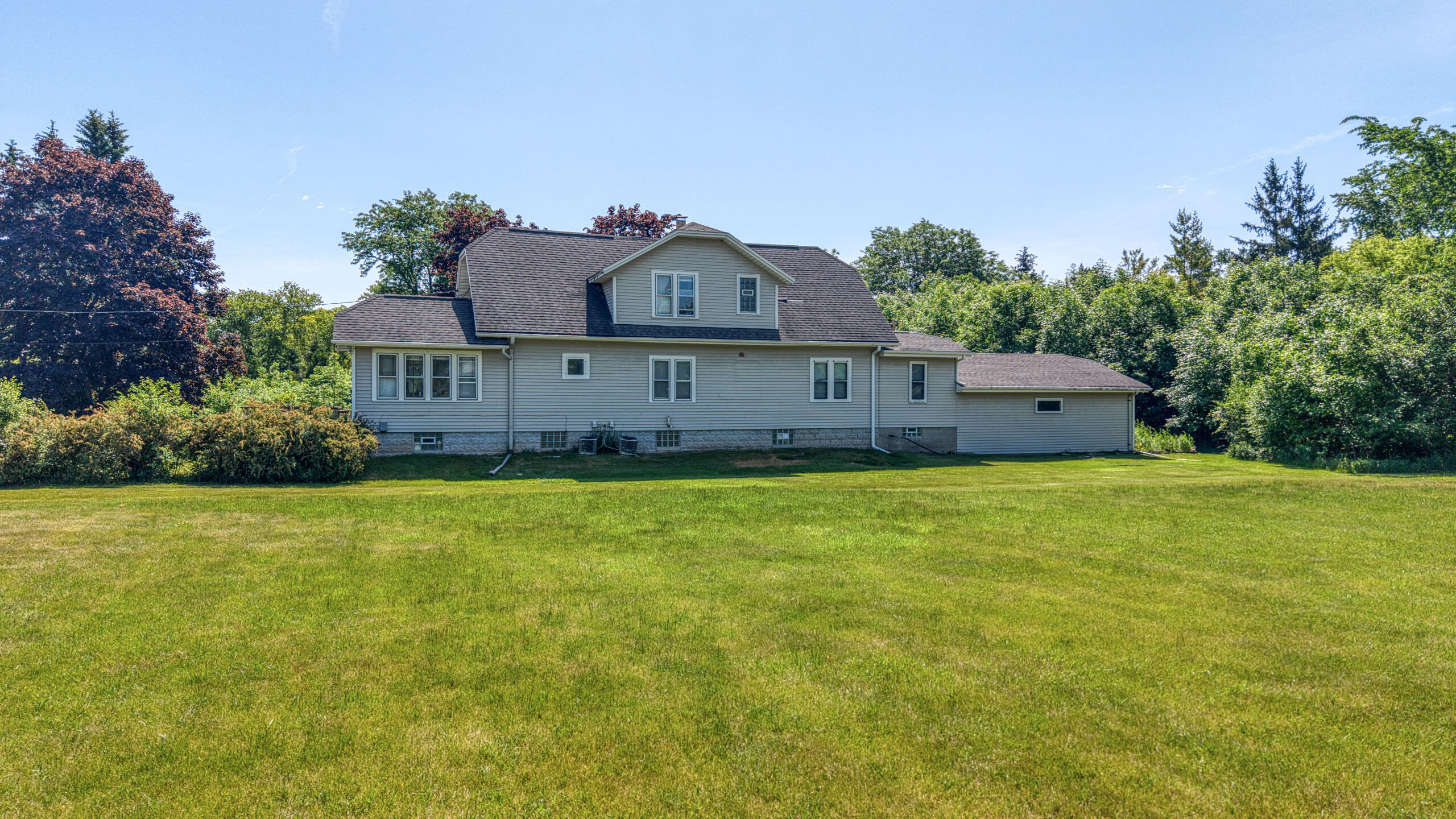 2029 West Donges Bay Road, Unit 2031 Mequon, WI 53092 - Photo 53 of 68 Back of Duplex
