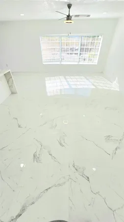 a view of a bathroom with a bathtub