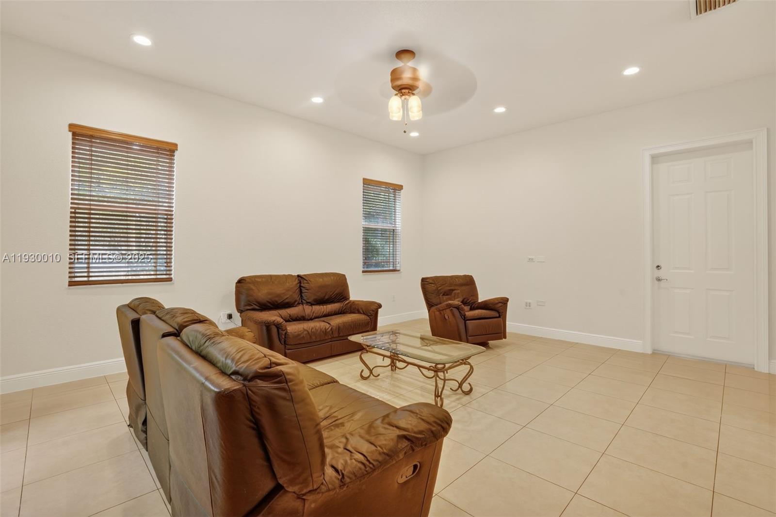 2913 Southwest 13th Street Miami, FL 33145 - Photo 16 of 55 a living room with furniture and a window