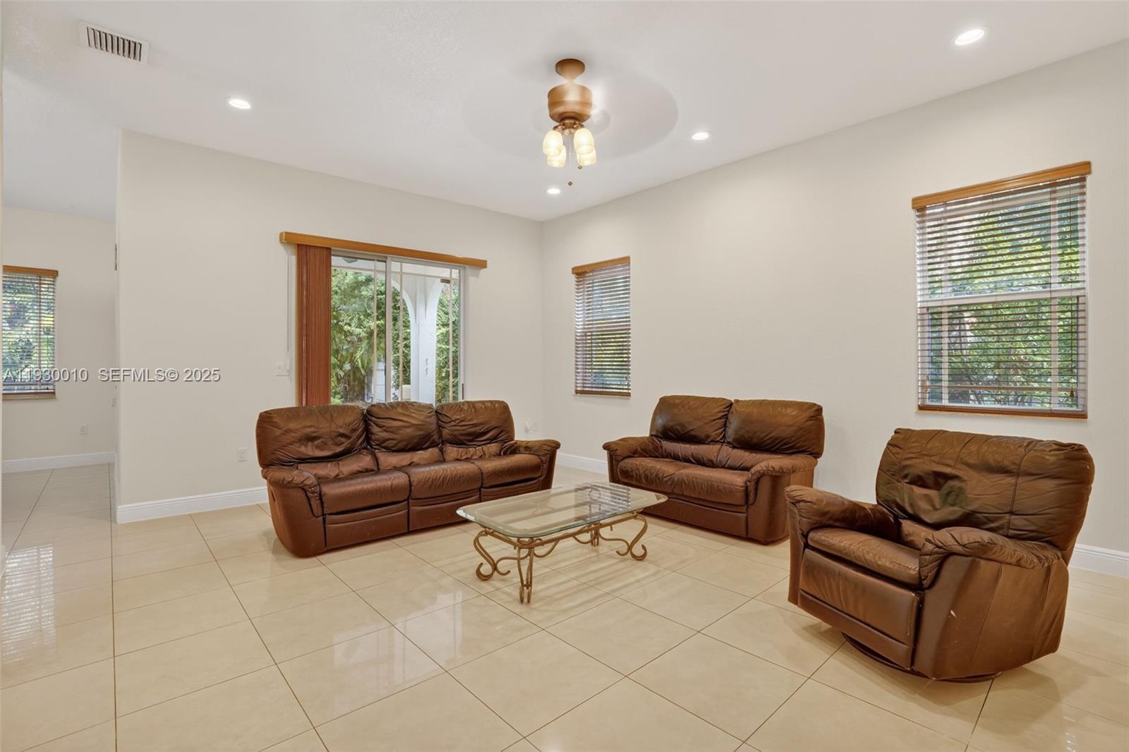 2913 Southwest 13th Street Miami, FL 33145 - Photo 17 of 55 a living room with furniture and a window