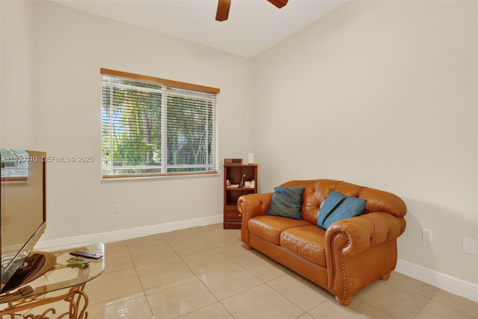2913 Southwest 13th Street Miami, FL 33145 - Photo 22 of 55 a living room with furniture and a window