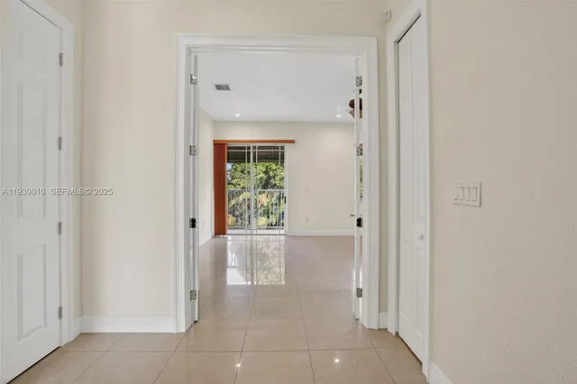 a spacious bathroom with a bathtub and shower