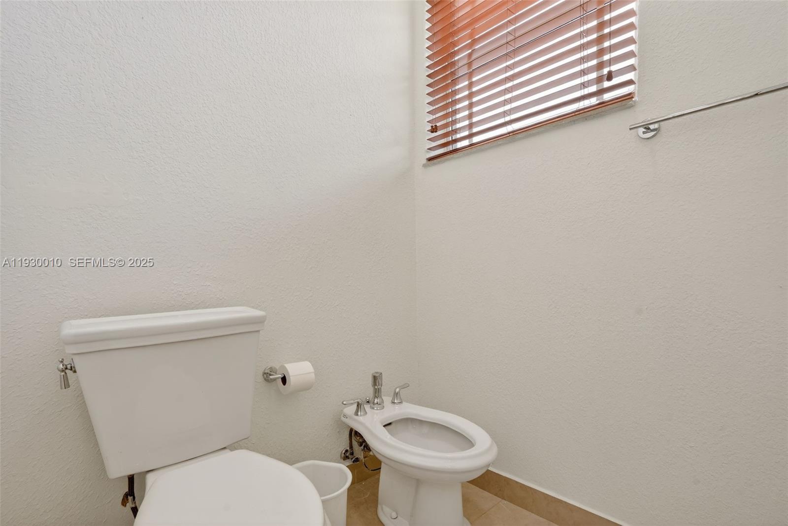 2913 Southwest 13th Street Miami, FL 33145 - Photo 31 of 55 a white toilet sitting next to a white sink