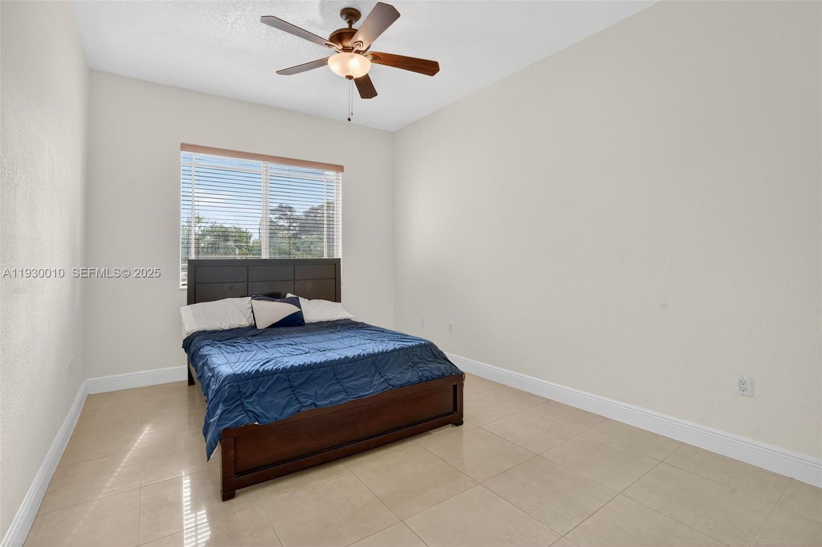 2913 Southwest 13th Street Miami, FL 33145 - Photo 32 of 55 a bedroom with a bed and window