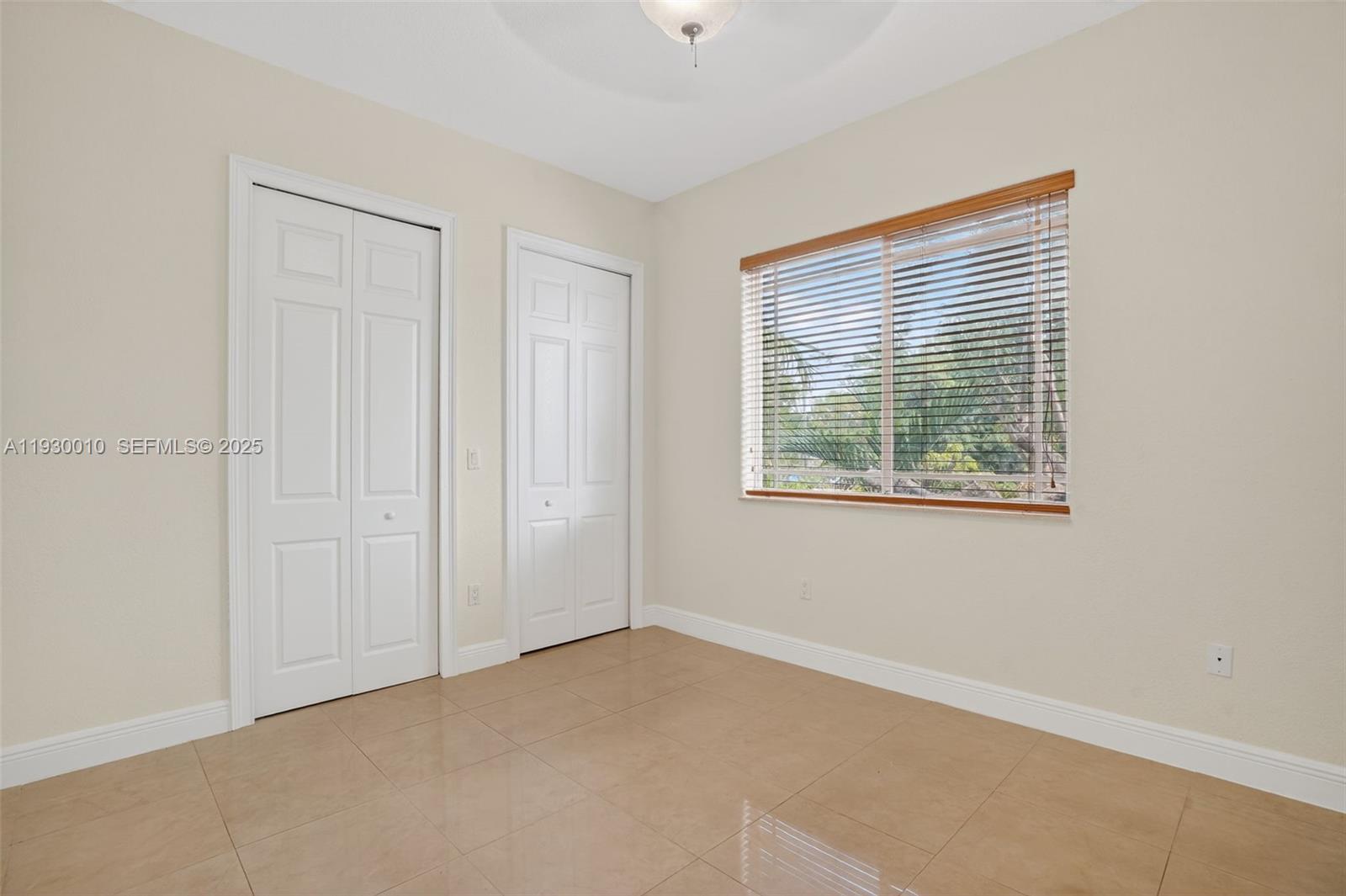 2913 Southwest 13th Street Miami, FL 33145 - Photo 35 of 55 an empty room with windows