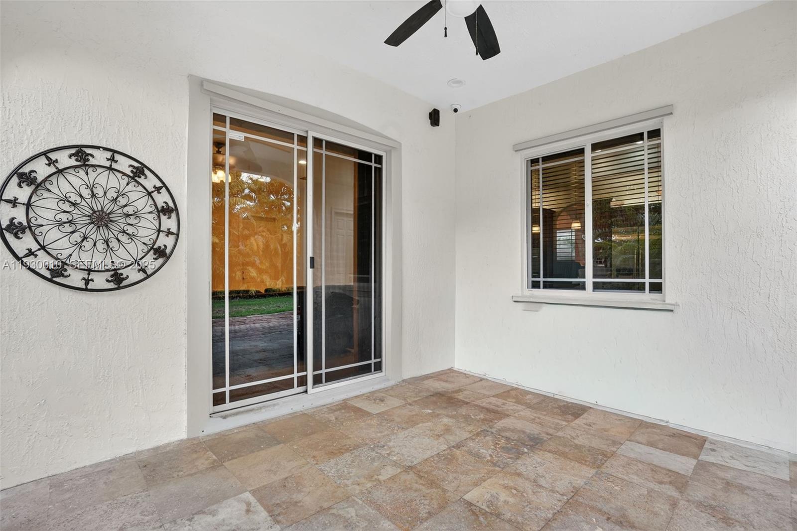 2913 Southwest 13th Street Miami, FL 33145 - Photo 42 of 55 a view of a hallway with a large window