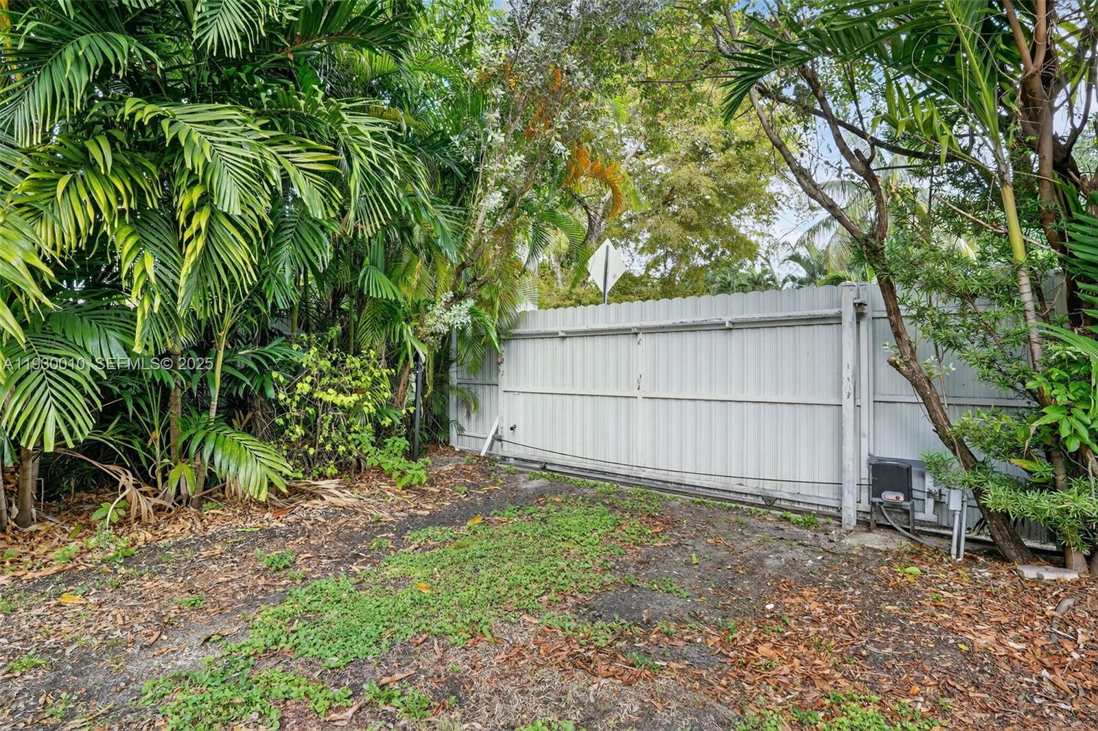 2913 Southwest 13th Street Miami, FL 33145 - Photo 45 of 55 a backyard of a house with lots of green space