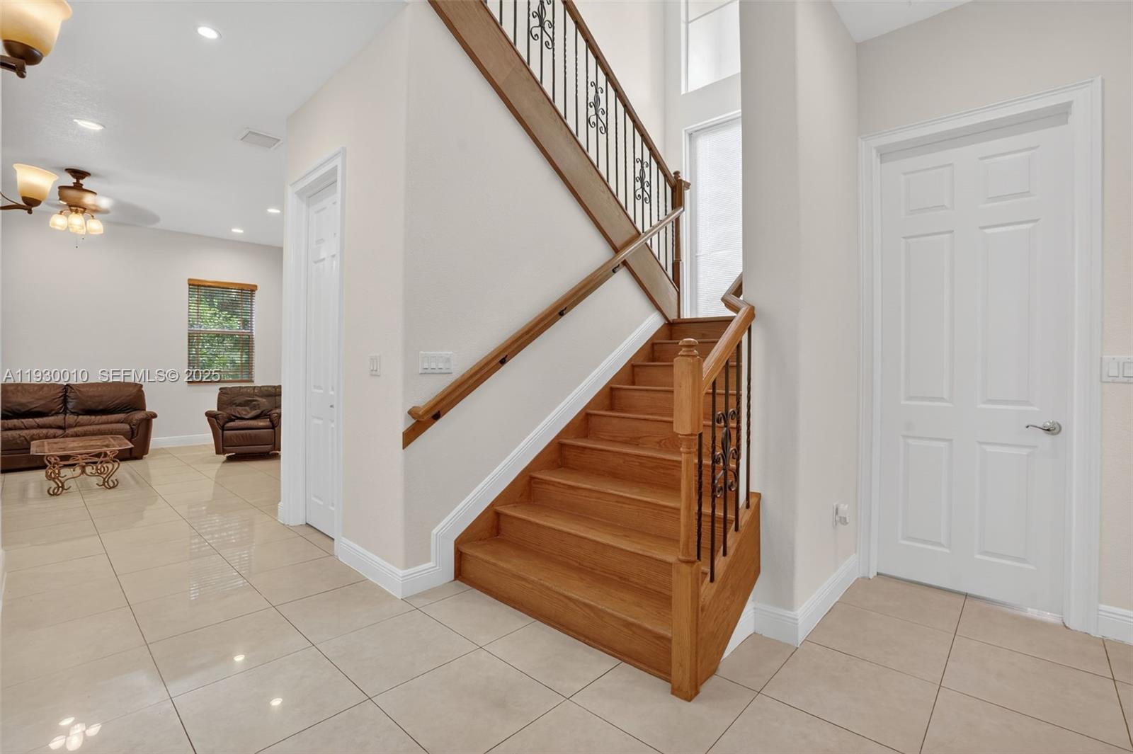 2913 Southwest 13th Street Miami, FL 33145 - Photo 8 of 55 a view of entryway and hall with wooden floor