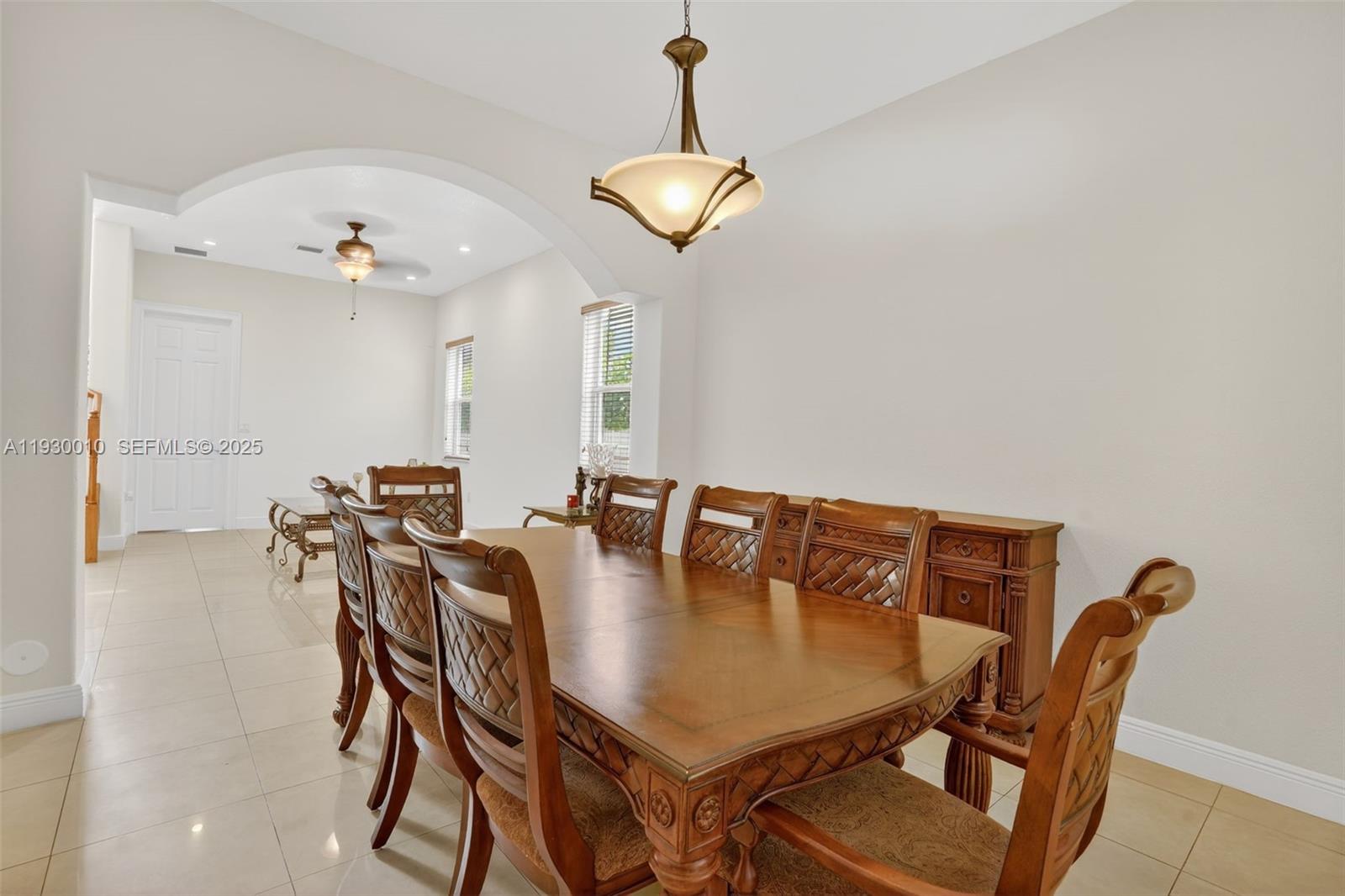 2913 Southwest 13th Street Miami, FL 33145 - Photo 10 of 55 a view of a dining room with furniture and a chandelier