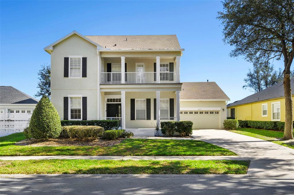 5933 Caymus Loop Windermere, FL 34786 - Photo 1 of 1 a front view of a house with a yard