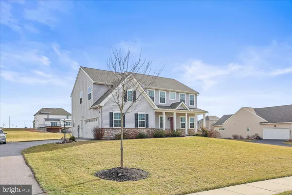a front view of a house with entertaining space