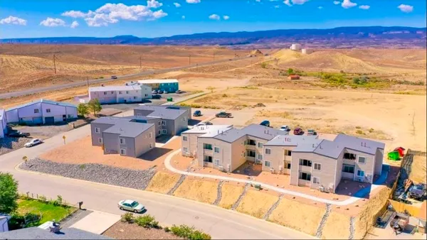 a view of city with ocean