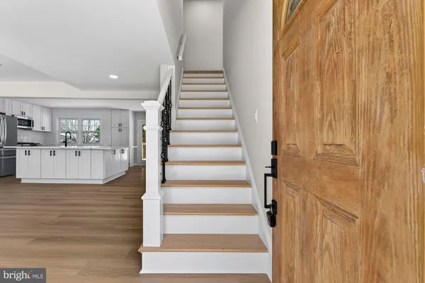 a view of kitchen and wooden floor