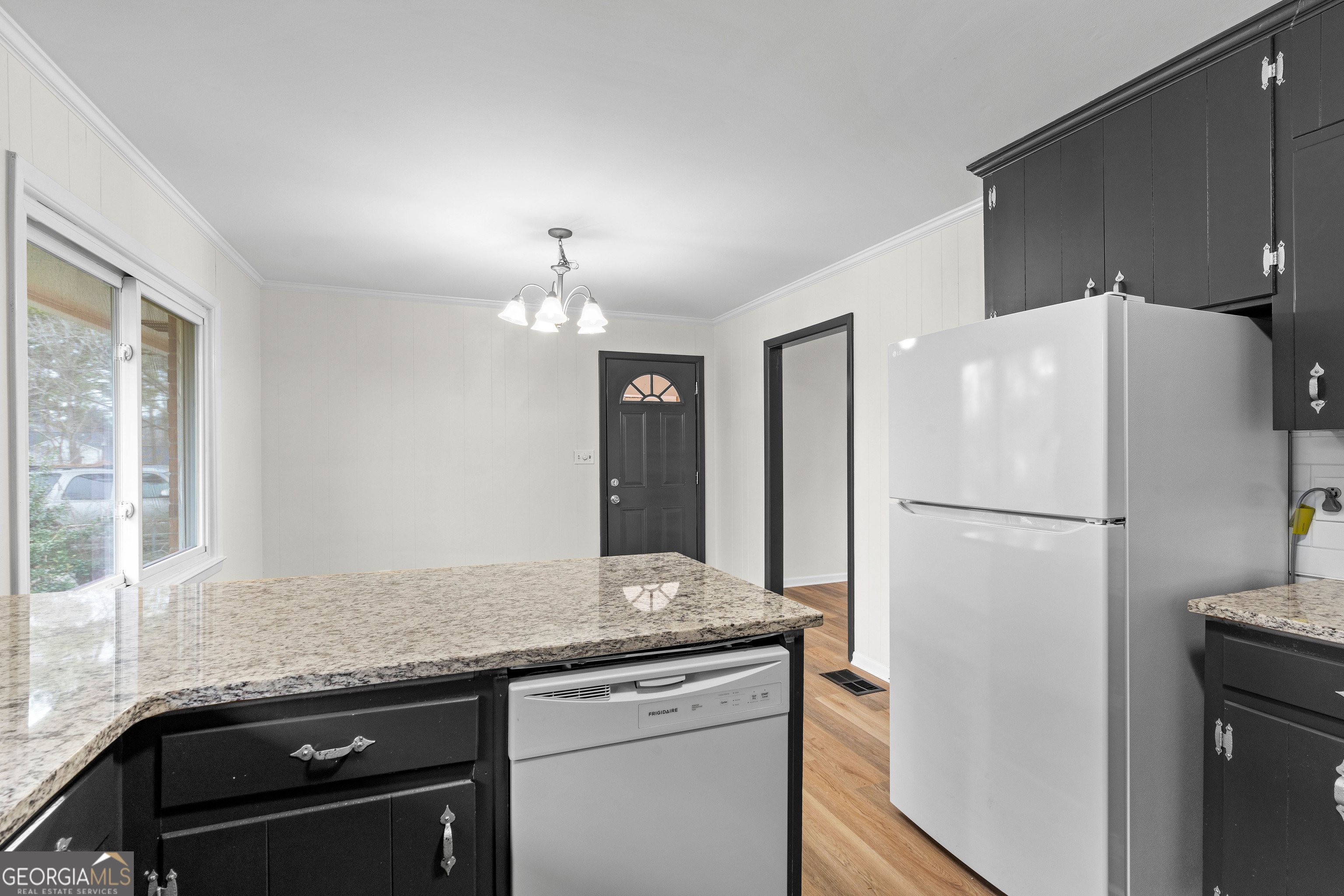 3548 Meadowview Court Rex, GA 30273 - Photo 15 of 41 a kitchen with granite countertop a refrigerator and a sink