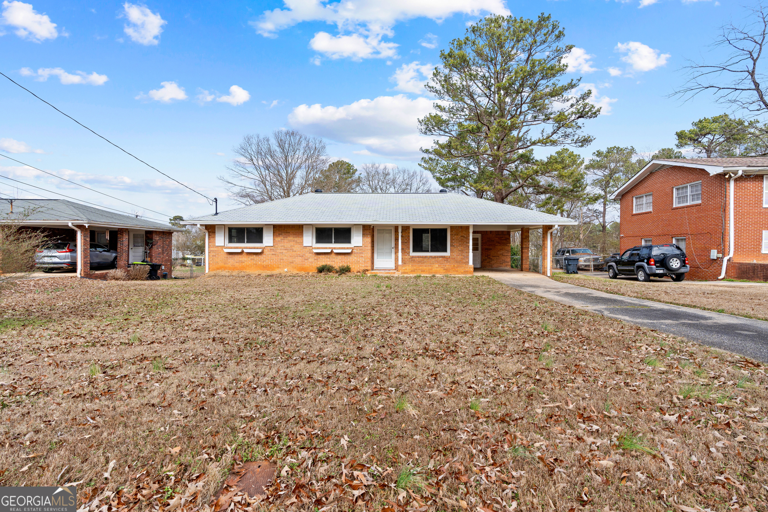 3548 Meadowview Court Rex, GA 30273 - Photo 2 of 41 a front view of a house with a yard