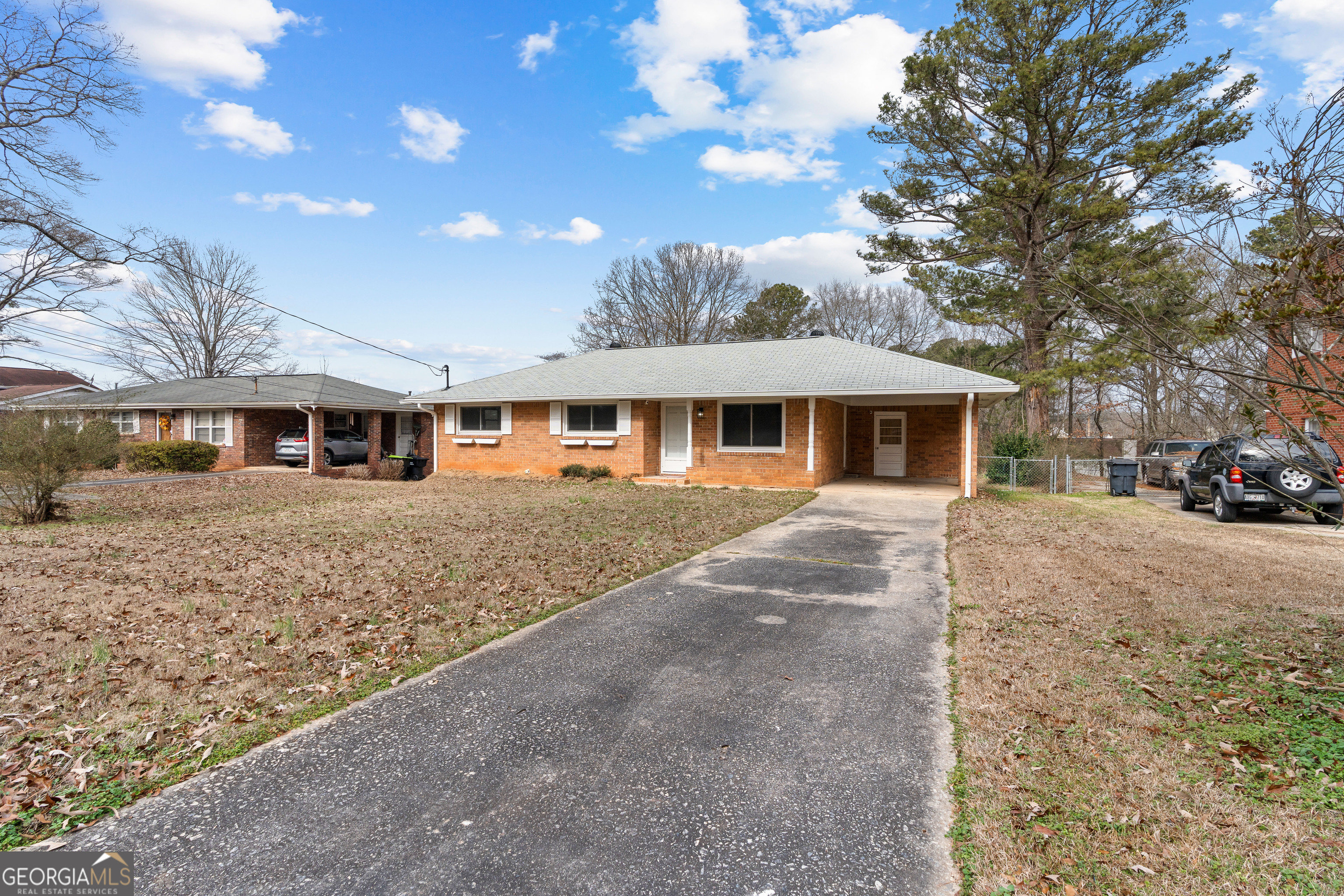 3548 Meadowview Court Rex, GA 30273 - Photo 3 of 41 a front view of a house with a yard