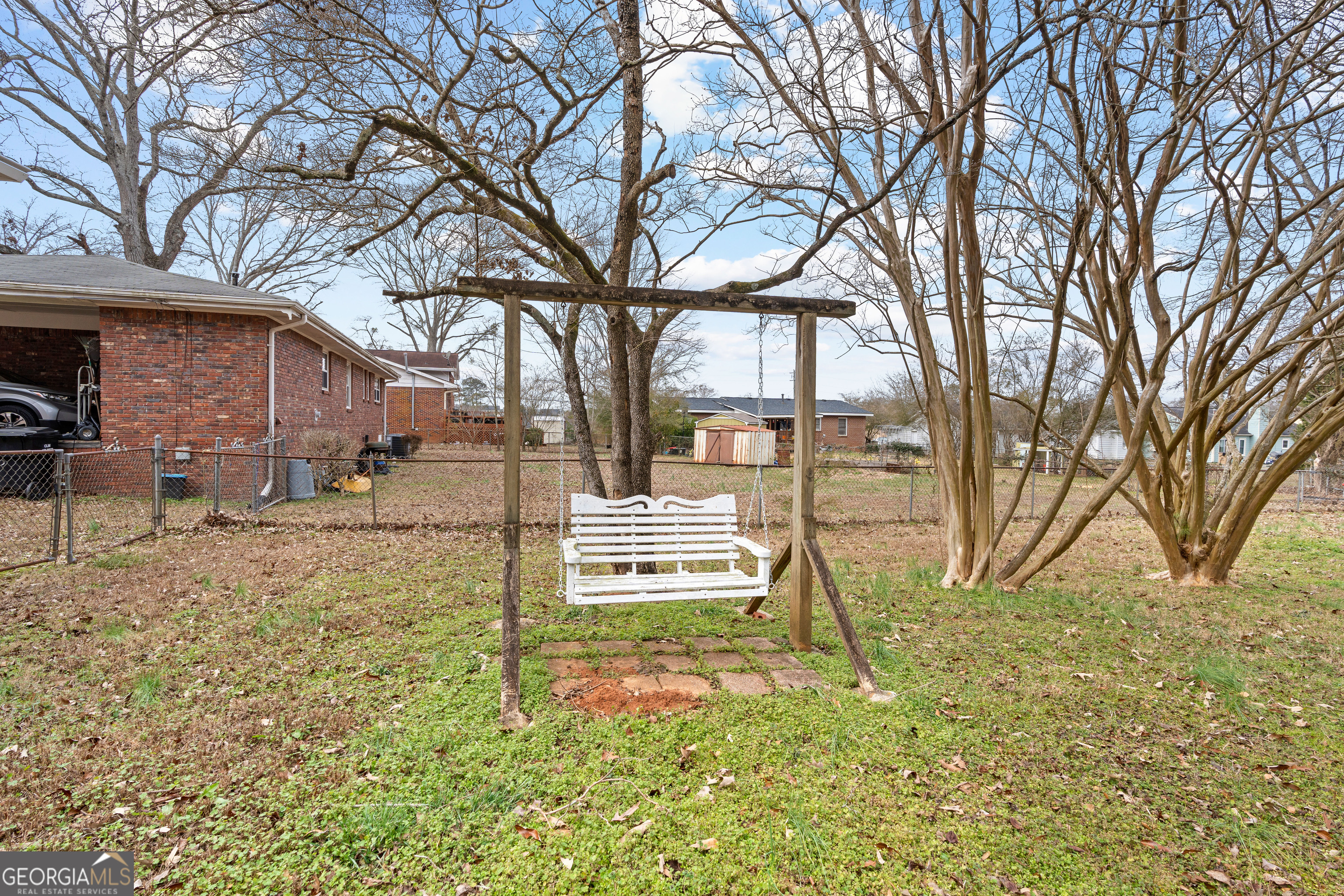 3548 Meadowview Court Rex, GA 30273 - Photo 32 of 41 a backyard of a house with table and chairs