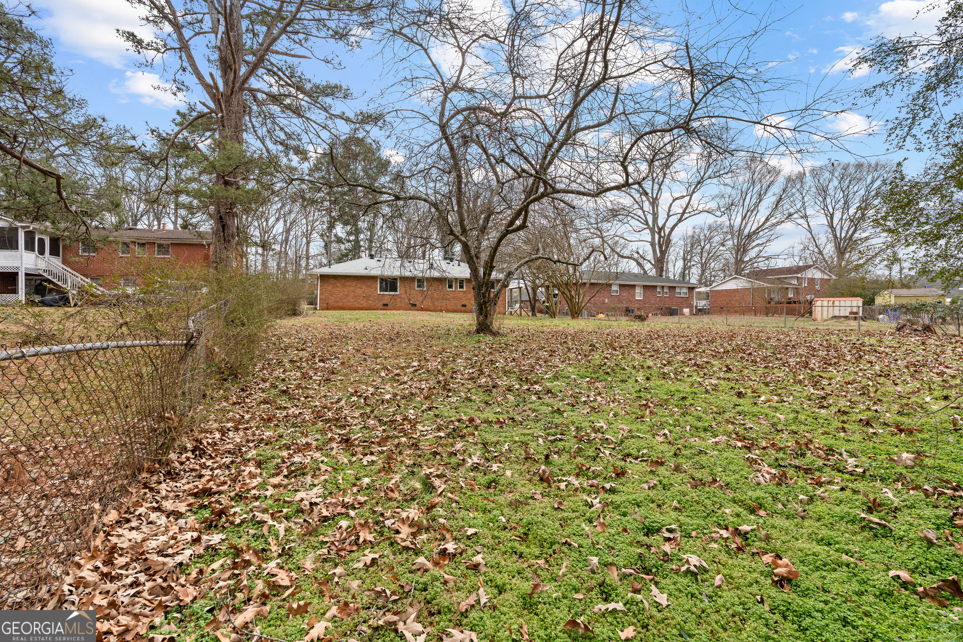 3548 Meadowview Court Rex, GA 30273 - Photo 36 of 41 a backyard of a house with lots of green space
