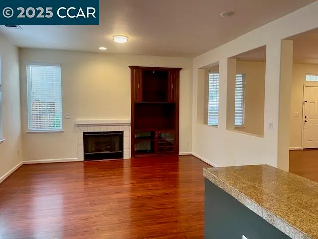 a view of kitchen with furniture and fireplace