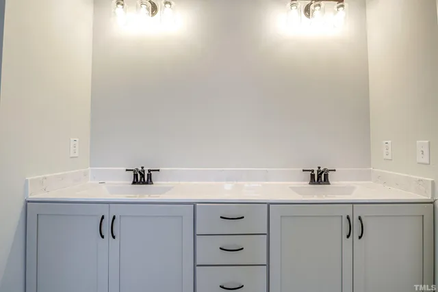 a bathroom with a sink toilet and bathtub