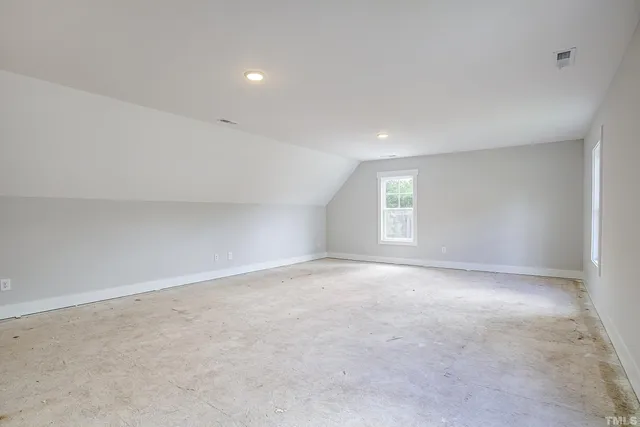 a view of a yard with a lake view