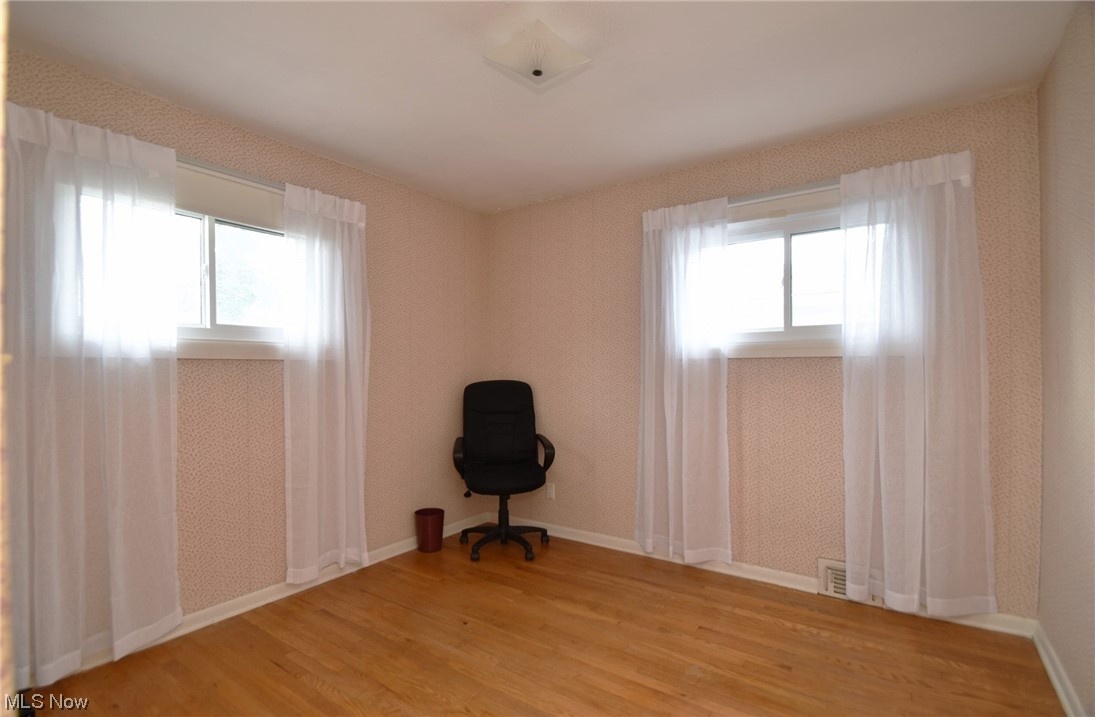 28740 Forest Road Willowick, OH 44095 - Photo 16 of 27 View of hardwood floored empty room