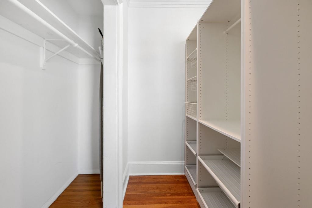 422 Grand Street, Unit 3 Hoboken, NJ 07030 - Photo 14 of 28 a view of walk in closet with empty racks