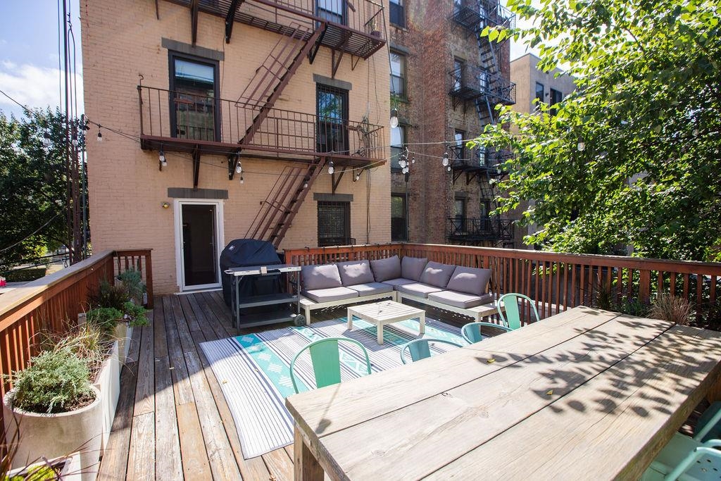 422 Grand Street, Unit 3 Hoboken, NJ 07030 - Photo 19 of 28 a view of balcony with wooden floor and seating space