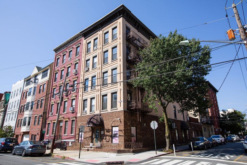 422 Grand Street, Unit 3 Hoboken, NJ 07030 - Photo 25 of 28 a front view of a building with street view