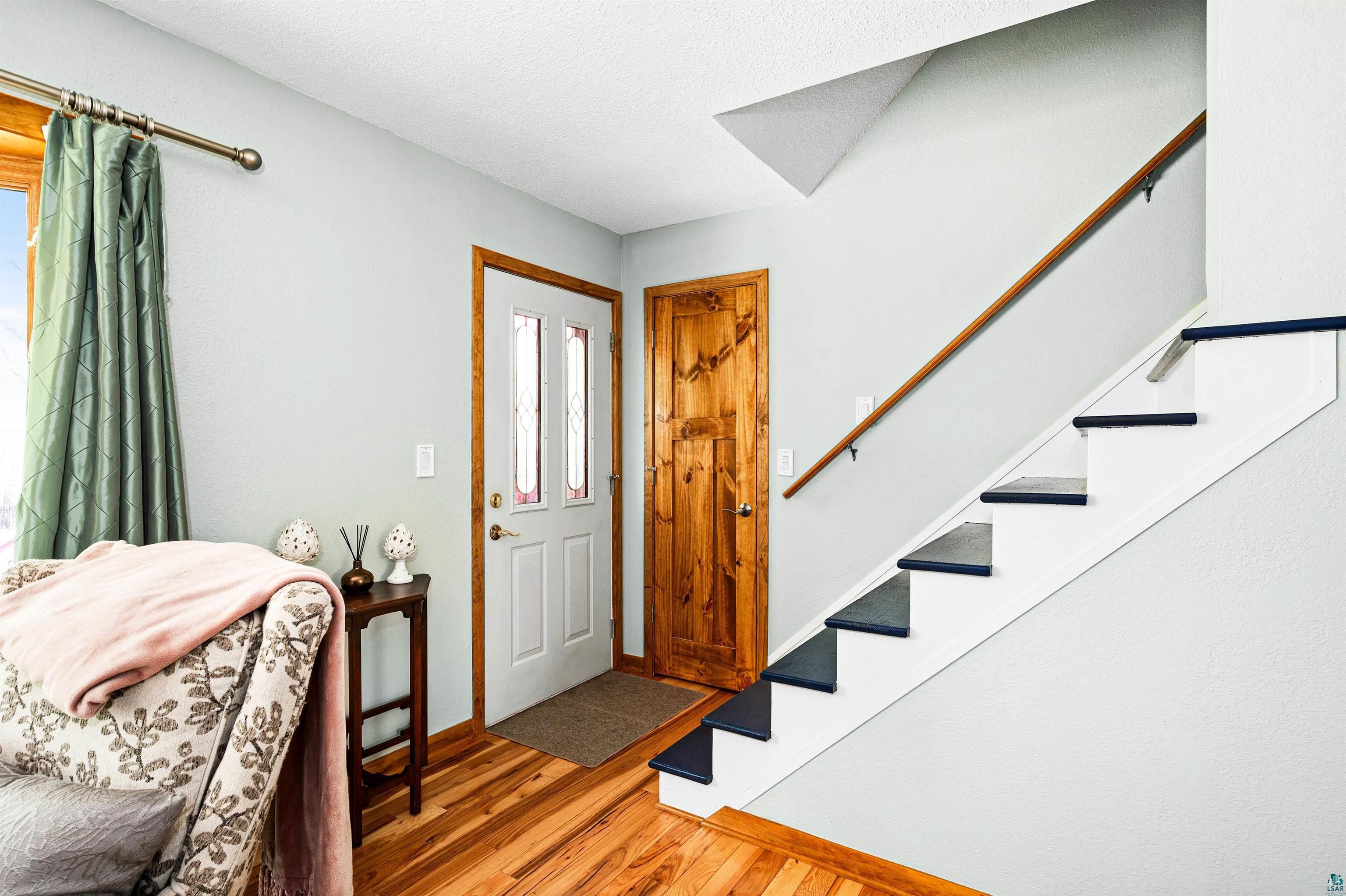 6908 Morris Thomas Road Cloquet, MN 55720 - Photo 13 of 41 Entryway featuring wood-type flooring