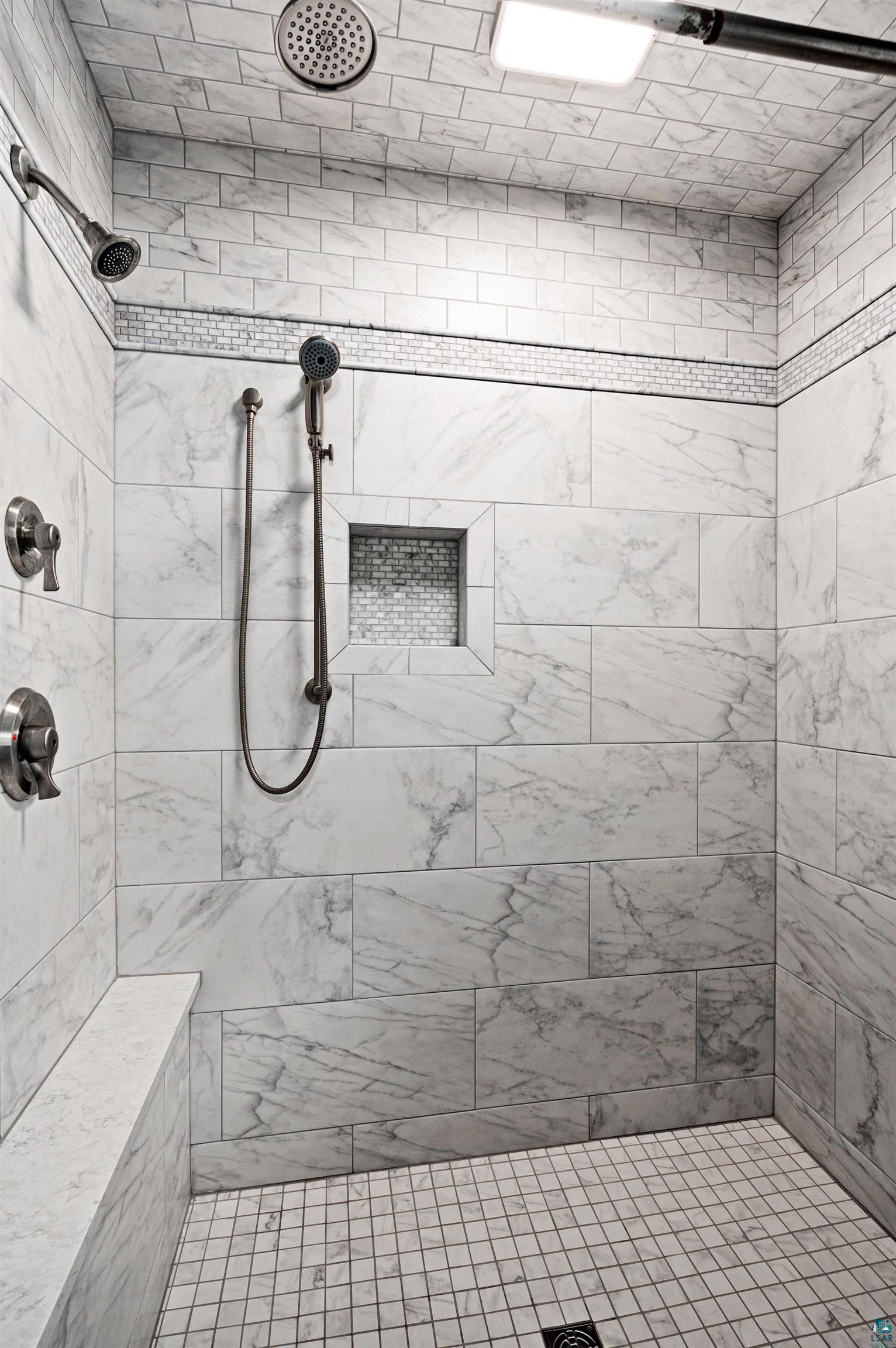 6908 Morris Thomas Road Cloquet, MN 55720 - Photo 21 of 41 Bathroom featuring a tile shower