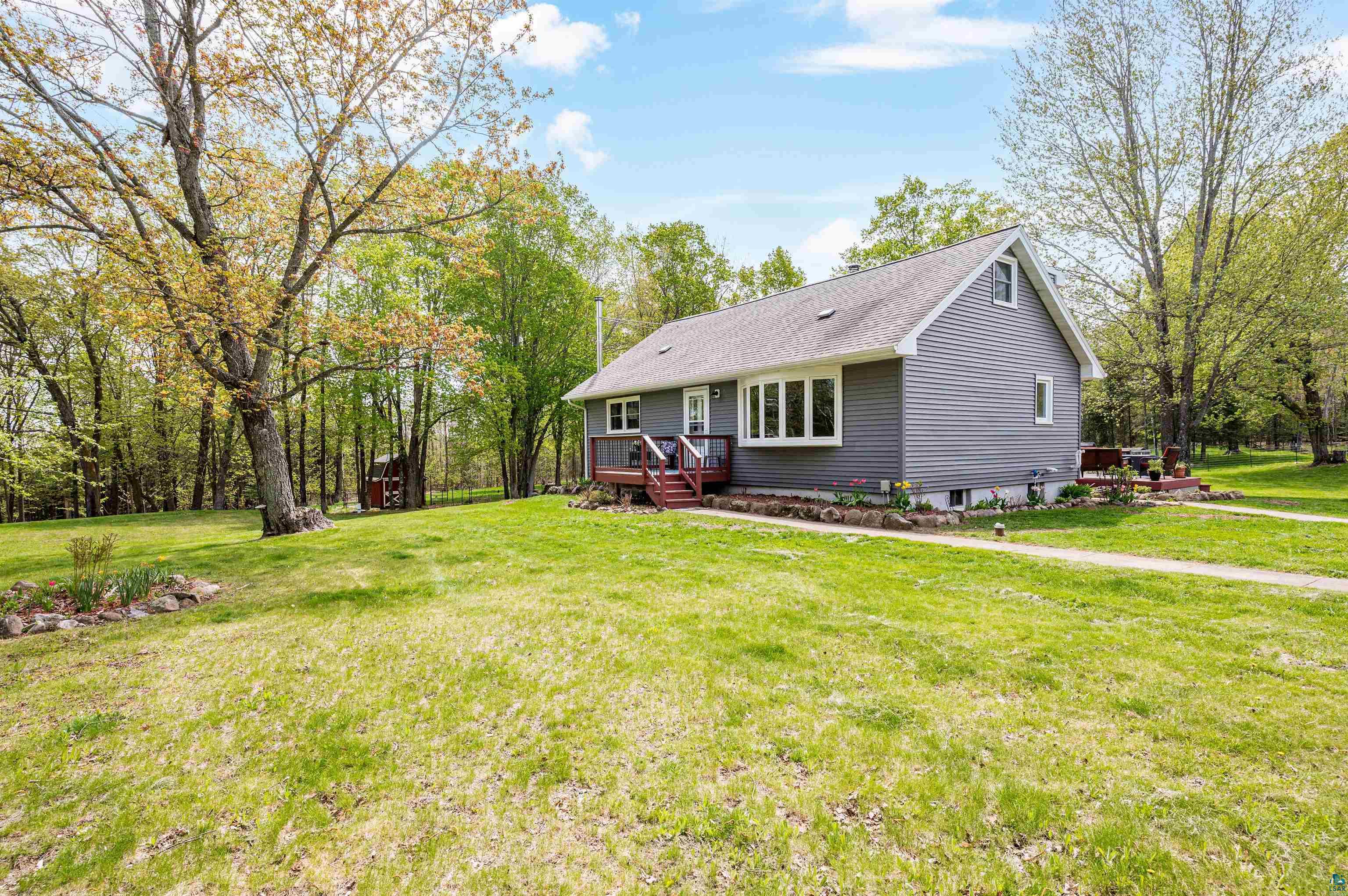 6908 Morris Thomas Road Cloquet, MN 55720 - Photo 40 of 41 View of yard with a deck